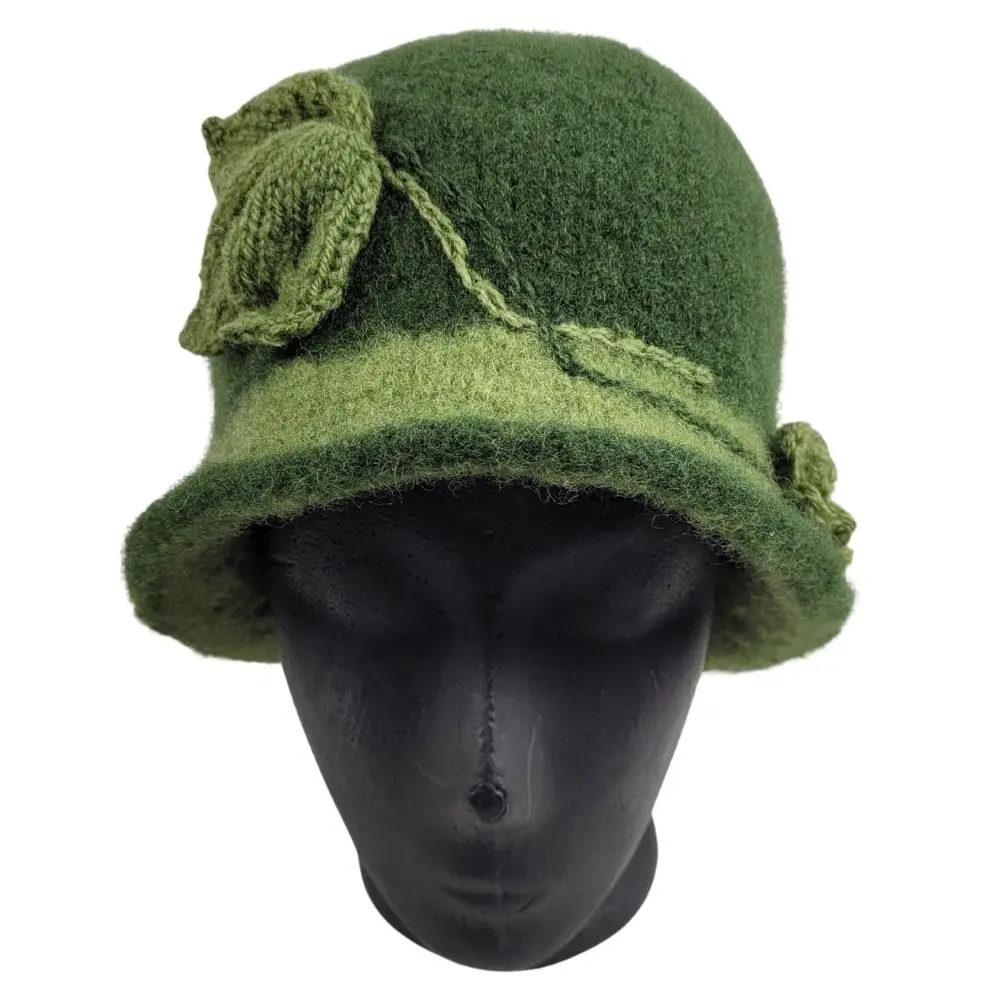 Hat i grøn forside