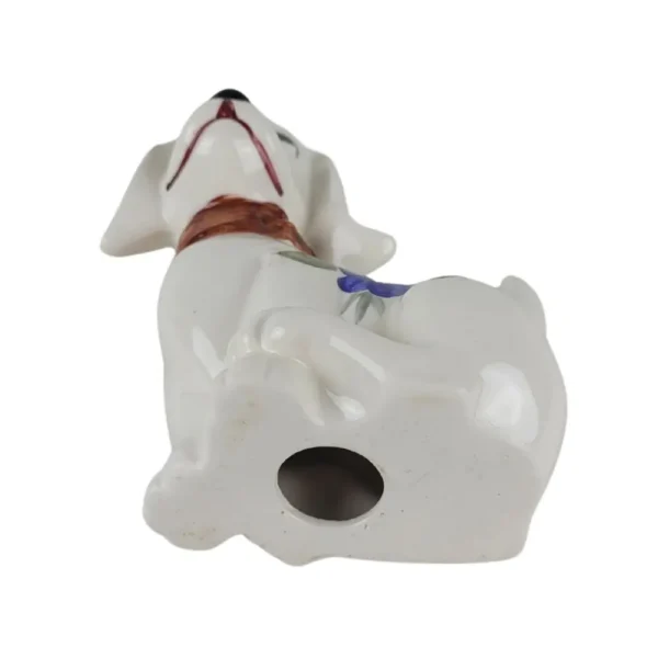 Hundefigur med blomstermønster fra bund