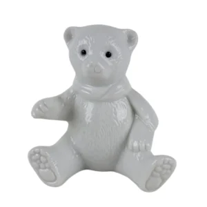 Siddende porcelæn bamse med halstørklæde