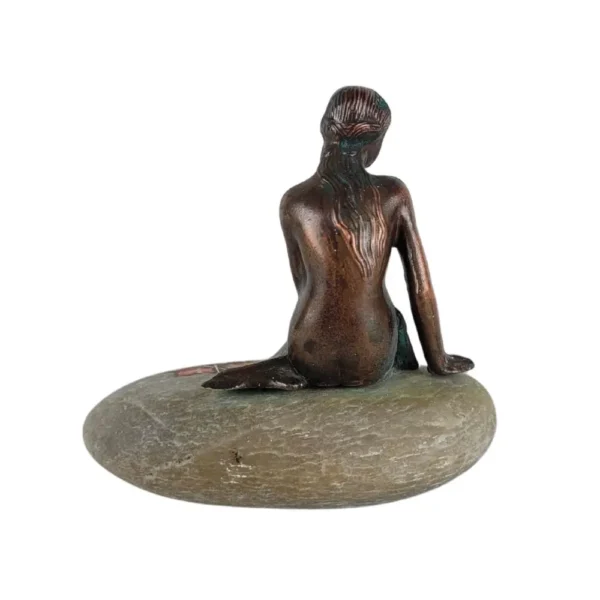 Lille havfrue figur fra bagside