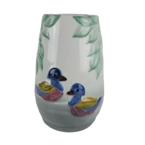 Vase med farverige fugle og bladmønster