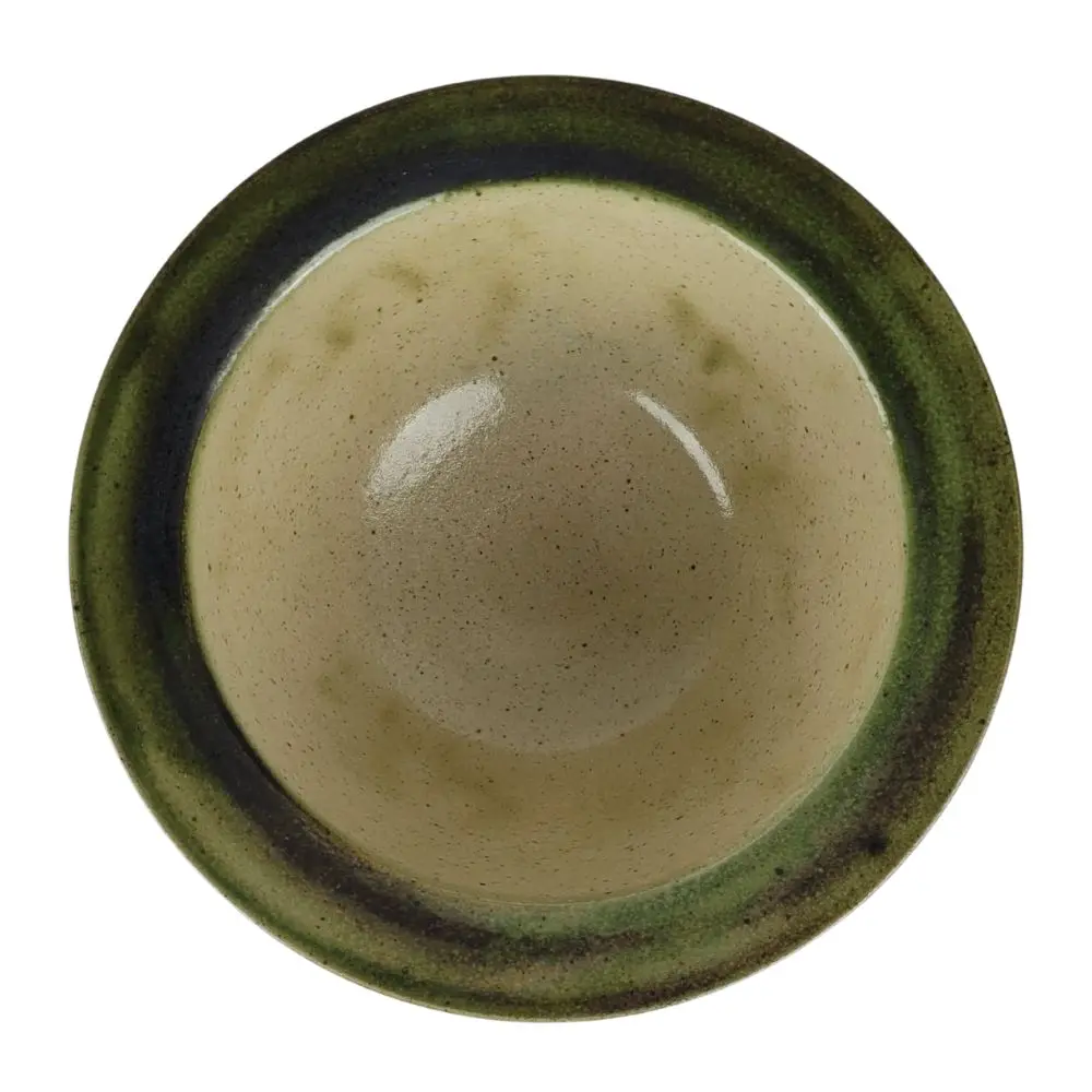 Håndlavet keramikskål med naturmotiv fra top