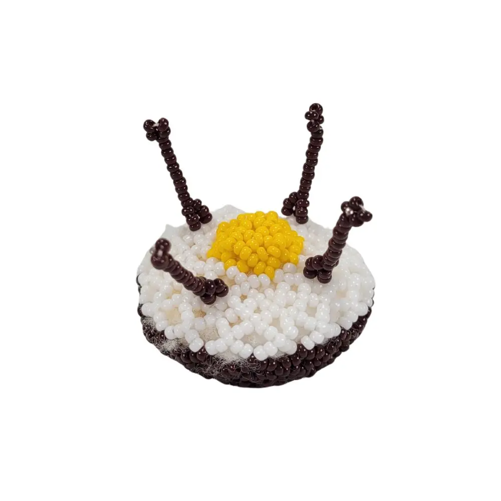 Perlenisse sæt med julegrød tæt på